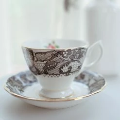 Staunton And Henry Black Lace Tea Cup And Saucer