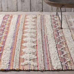 Staunton And Henry Lorax Cream And Colourful Rug