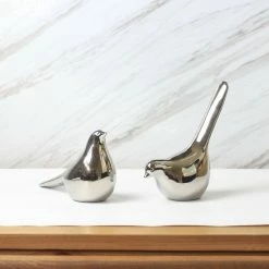 Staunton And Henry Home Accessories Pair Of Silver Sparrows